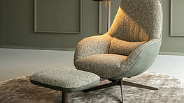 Christine Kröncke comfortable Relaxfauteuil Momo Light with tilt function and stool at Grünbeck Einrichtungen Vienna