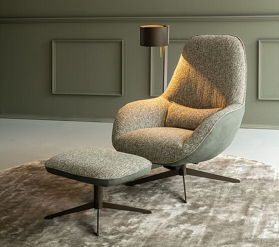 Christine Kröncke comfortable Relaxfauteuil Momo Light with tilt function and stool at Grünbeck Einrichtungen Vienna