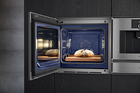The new Gaggenau Expressive Series, featuring an oven, steam oven, warming drawer, vacuum sealer drawer, and fully automatic coffee machine, is on display and available at Grünbeck Einrichtungen Vienna