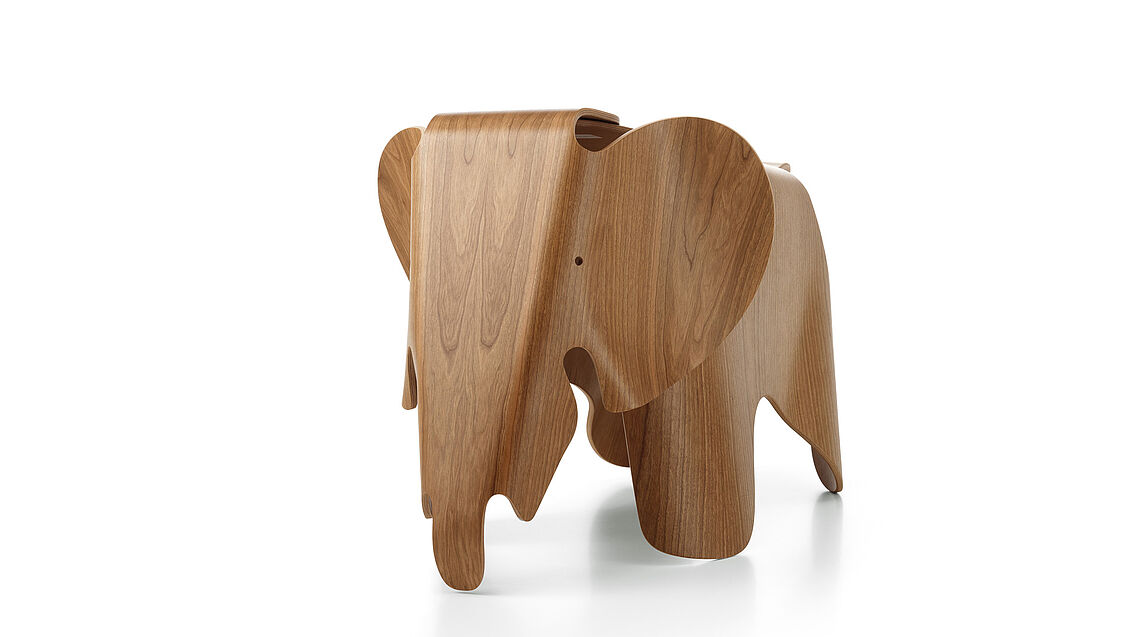 Vitra Eames Baby Elefant Serie in Sperrholz mit Kirschfurnier bei Gruenbeck Interiors Wien