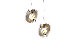 The Fiam Tau pendant light in bronze or smoked glass is available from Grünbeck Einrichtungen.