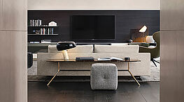 The Mondrian console table by Poliform with a delicate metal frame and a top in marble, wood or lacquered finish – available from Grünbeck Einrichtungen.