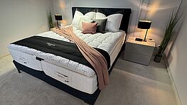 The Treca Paris Kate bed, complete with the Imperial Air Spring Prestige Neo mattress and mattress topper, is available at a discounted sale price at Grünbeck Einrichtungen.