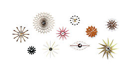 vitra-wall-clocks-george-nelson-sunflower-triangle-eye-clock-uhren-metall-holz-bunt-besonders-modern-grünbeck-gruenbeck-einrichtungen-wien-schauraum-haendler-designhouse-interior-design-vienna-innenarchitekturbuero-einrichtungshaus-moebelhaus-designmoebel-markenmoebel
