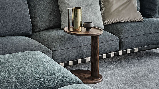 Flexform side table Oliver made of solid wood available in the Grünbeck Vienna showroom