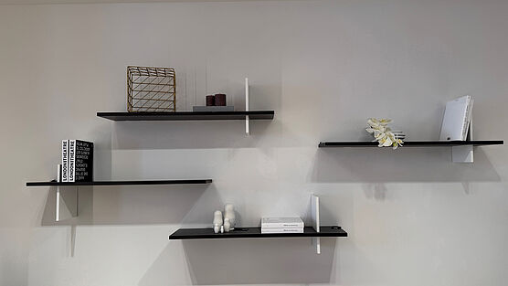 The Cattelan Cross Boarde in wood are now available at a reduced price in the design sale at Grünbeck Einrichtungen.