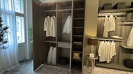 The Poliform Senzafine Sand 3-door wardrobe in melamine oak is available at a great price from Grünbeck Einrichtungen.