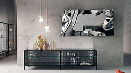 The Fiam wall mirror Christine - fused-molded-silver-plated - available in mirrored glass, bronze glass or smoked glass and two sizes at Grünbeck Interios Vienna