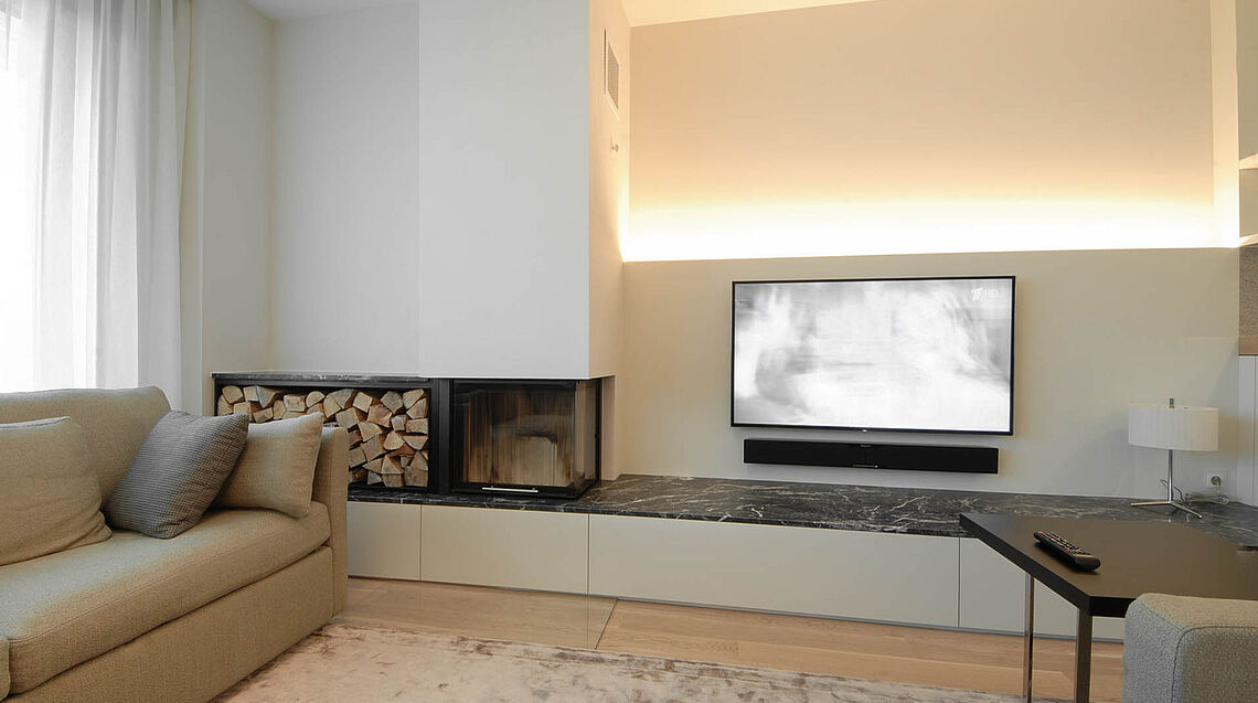 Planning and implementation of living room by Grünbeck Einrichtungen Vienna