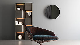 Christine Kröncke Lumen Display Cabinet | A harmonious composition of metal and wood with integrated LED lighting | Available in six metal finishes and four wood shades at Grünbeck Einrichtungen, 1050 Vienna