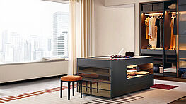 Poliform Set Up is an island chest of drawers with open compartments, drawers and a glass top – accessible from all four sides. Available from Grünbeck Einrichtungen Vienna.