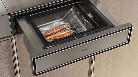 The new Gaggenau Expressive Series, featuring an oven, steam oven, warming drawer, vacuum drawer, and fully automatic coffee machine, is on display and available at Grünbeck Einrichtungen Vienna
