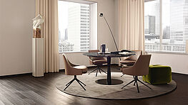 Flute by Poliform is an elegant dining table with a delicate frame and a round top, available in marble or other finishes at Grünbeck Einrichtungen Vienna.